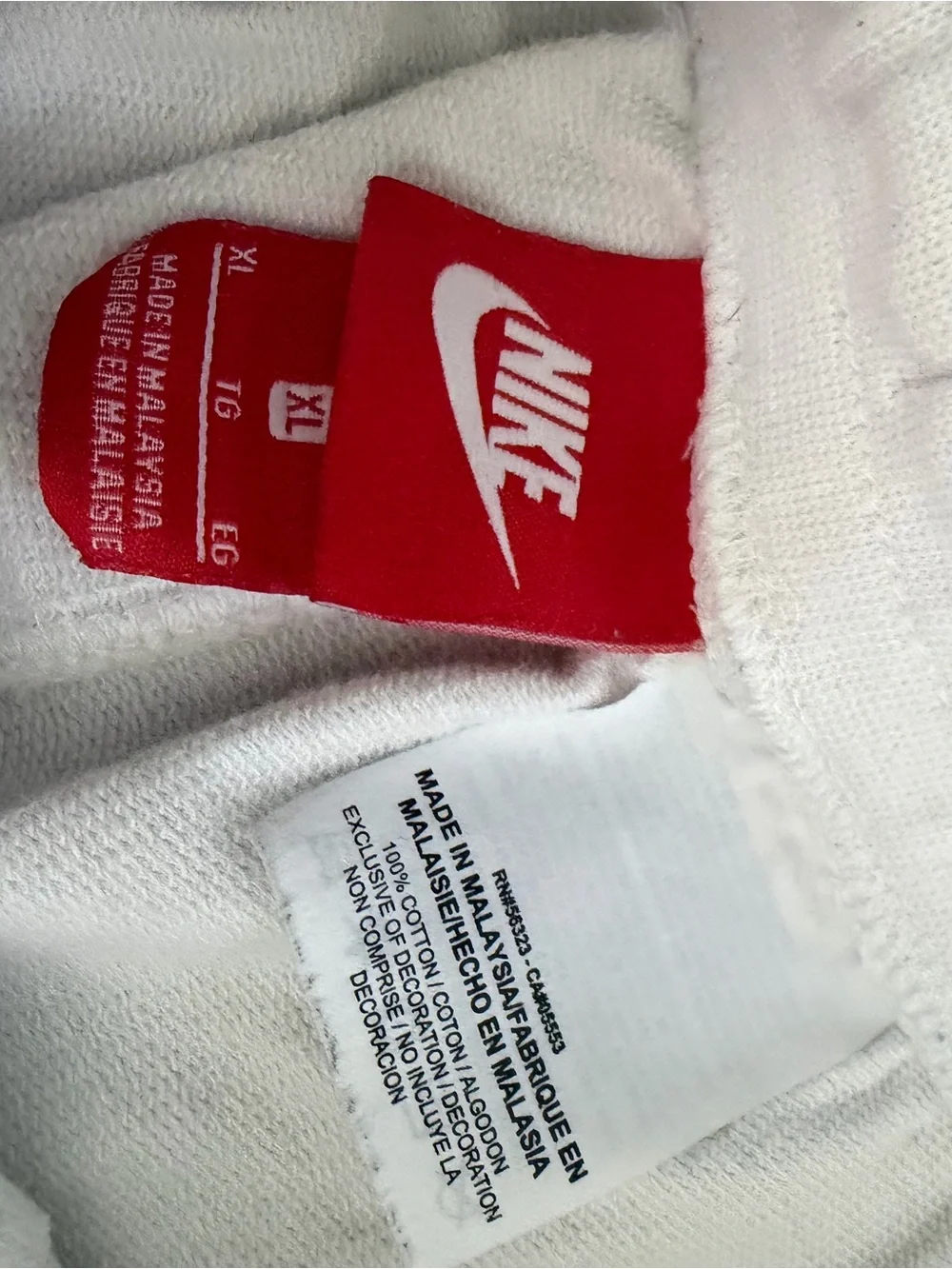 Nike White Athletic Shorts with Black Logo